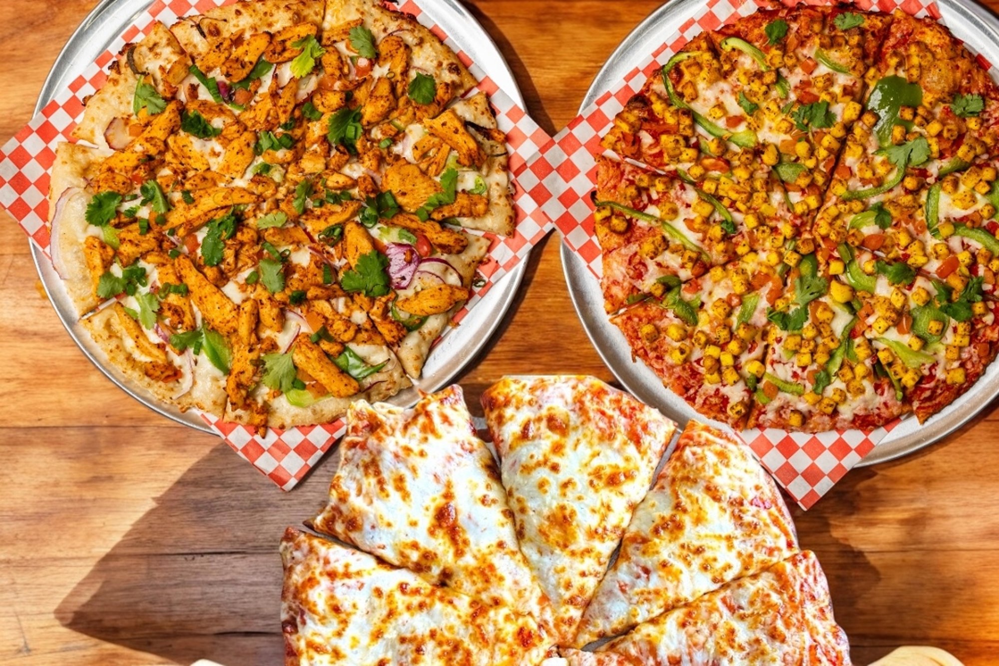 #4 Family Kids Feast - 2 Large Specialty Pizza and Get 1 Small Cheese Pizza Free