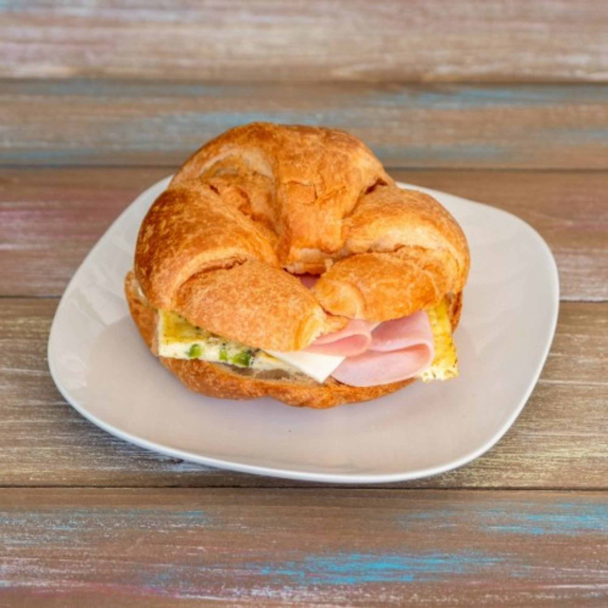 Ham, Egg, Cheese, and Jalapeño Croissant Sandwich