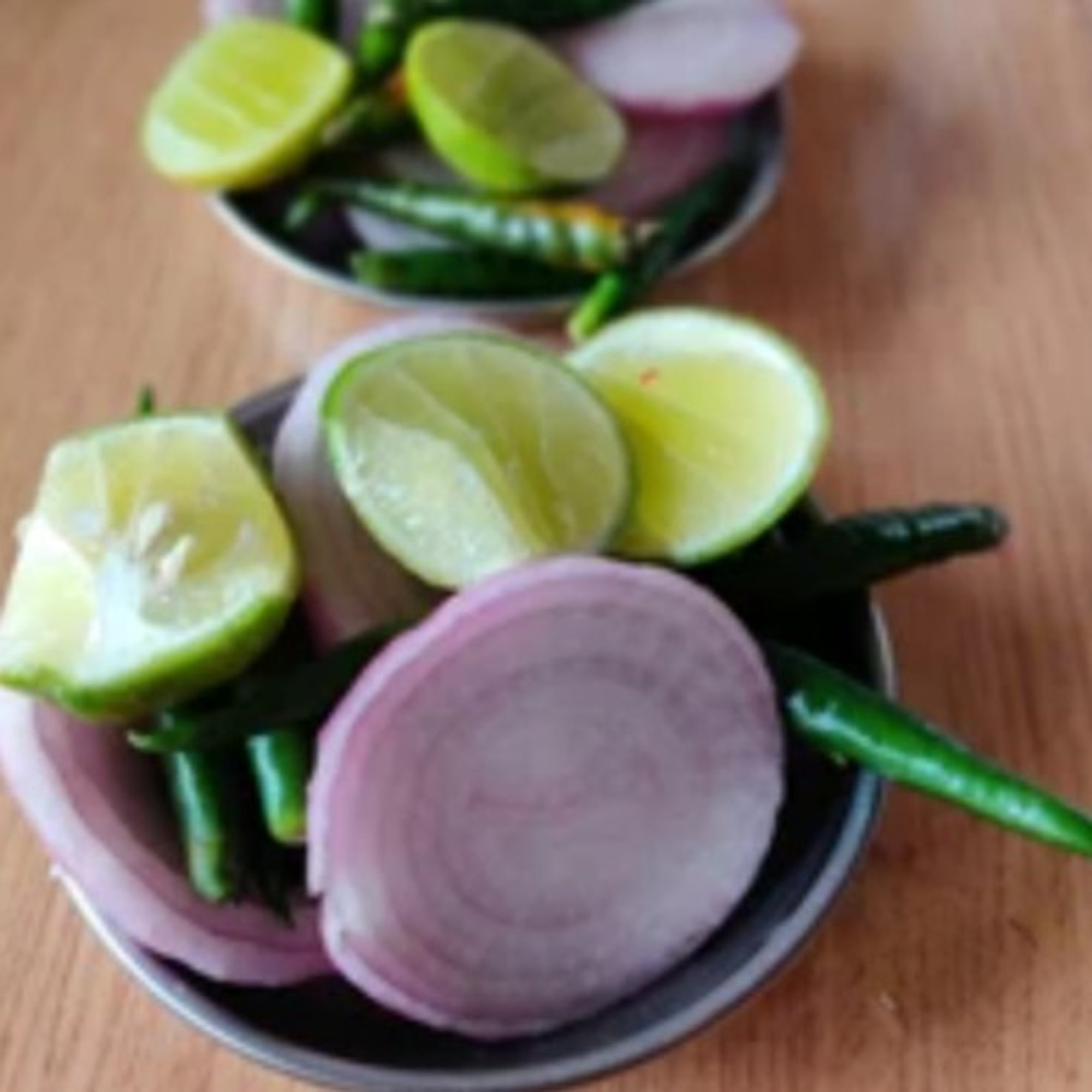 Cut lemon, onion n chilli
