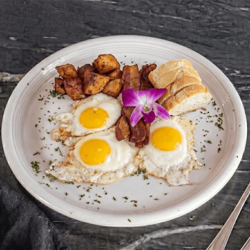 3 Eggs, Baguette, Bacon, Homestyle Potatoes, and Brewed Coffee