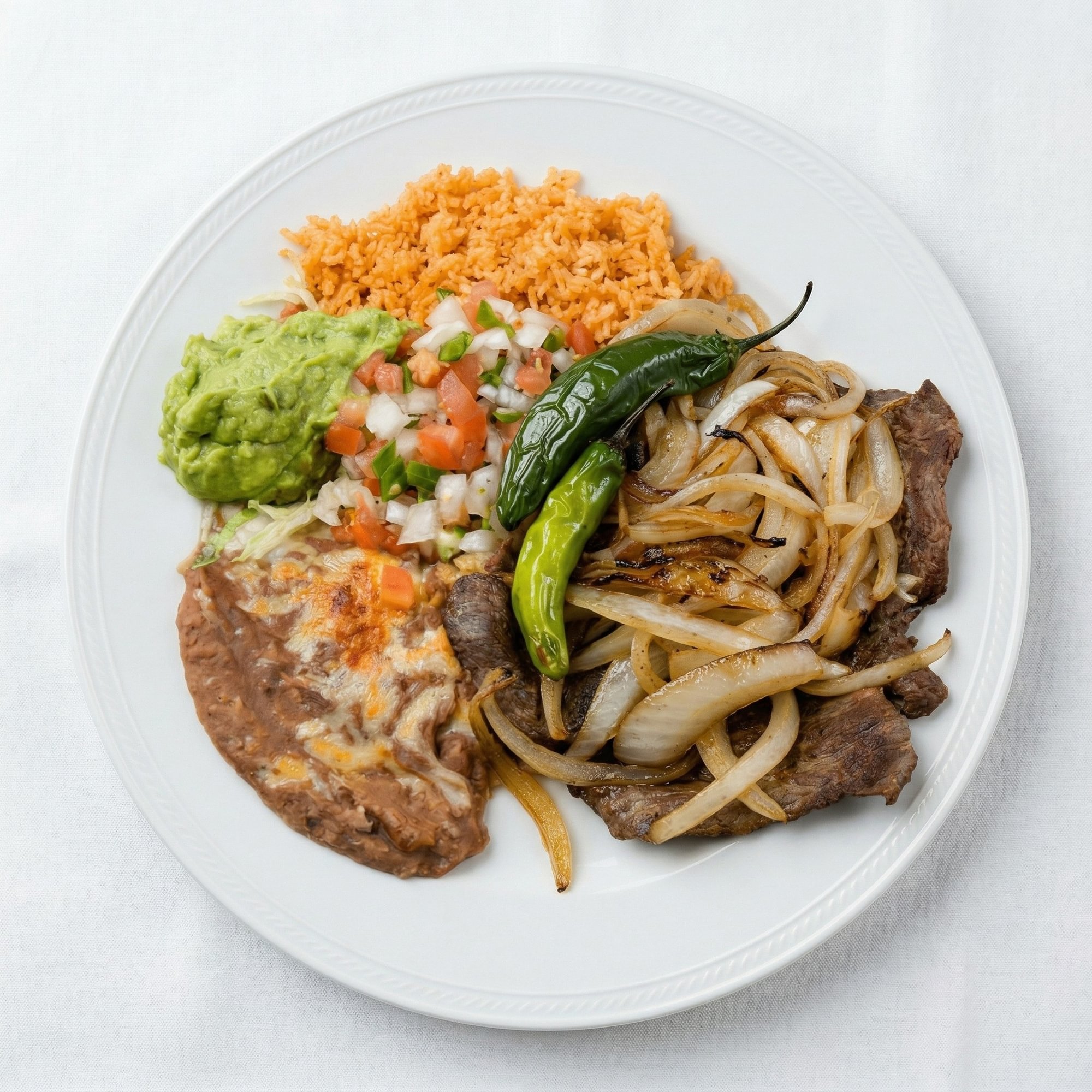Bisteak Encebollado