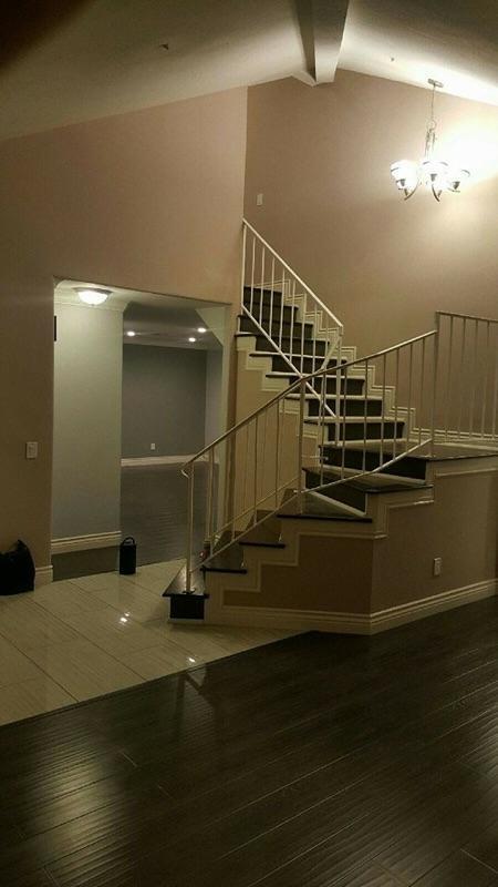 T and M Construction Logo