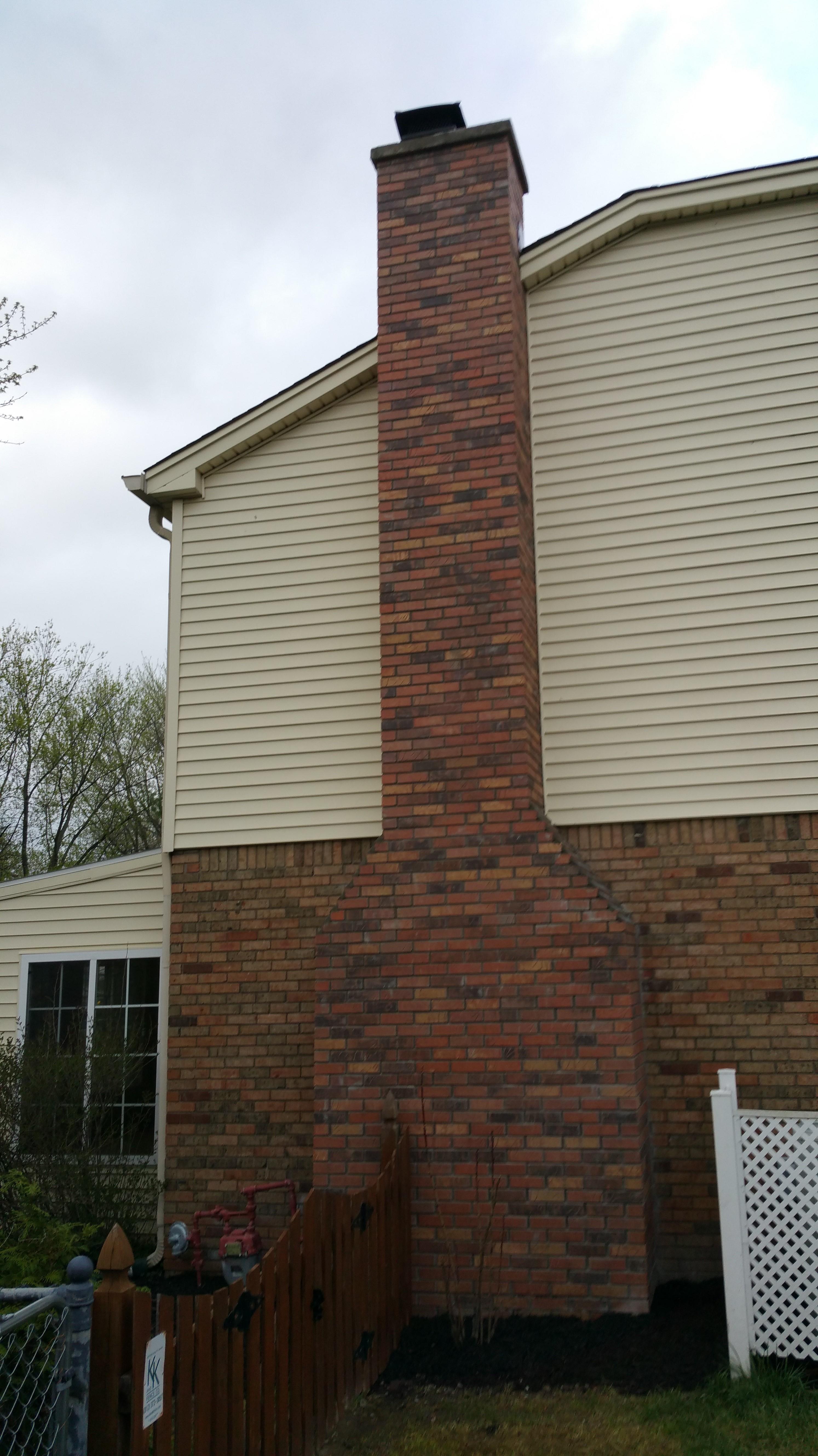 This is the after picture once we removed the entire chimney and re-installed it, 