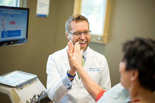 Sometimes you have to high five to dental care! Call your local office with any questions or to book an appointment.