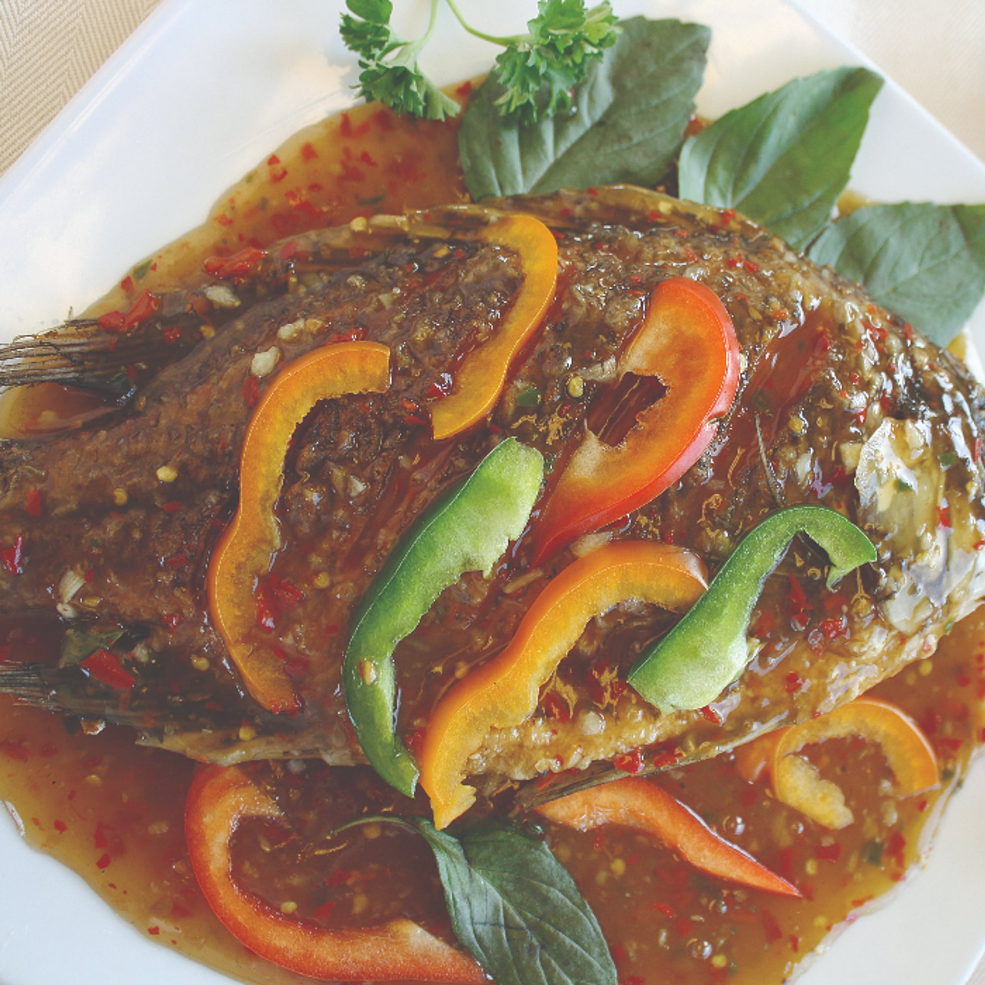 64. Tilapia over Thai Chili Sauce