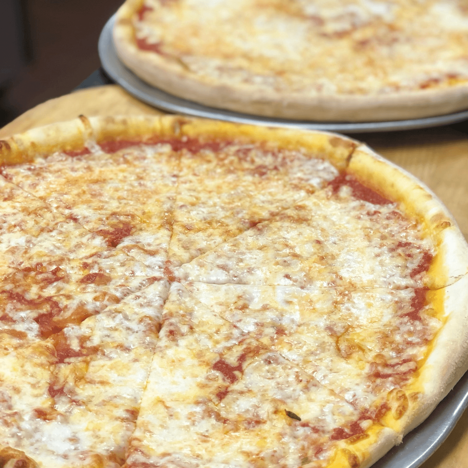 2 large cheese pizzas