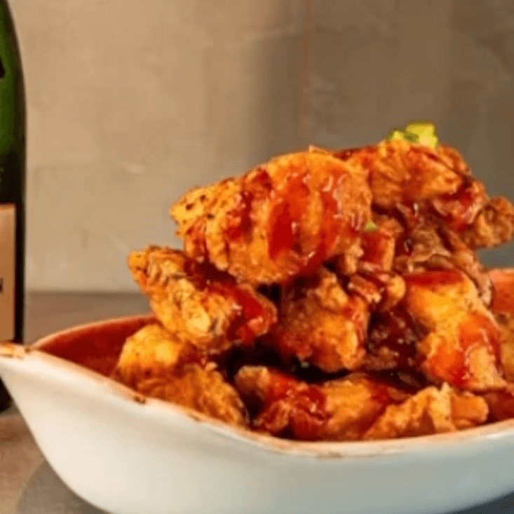 Hot Honey truffle chicken bites  w/ fries