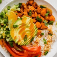 Vegan Rice Bowl - Carrots, cucumber, avocado, sautéed mixed veggies