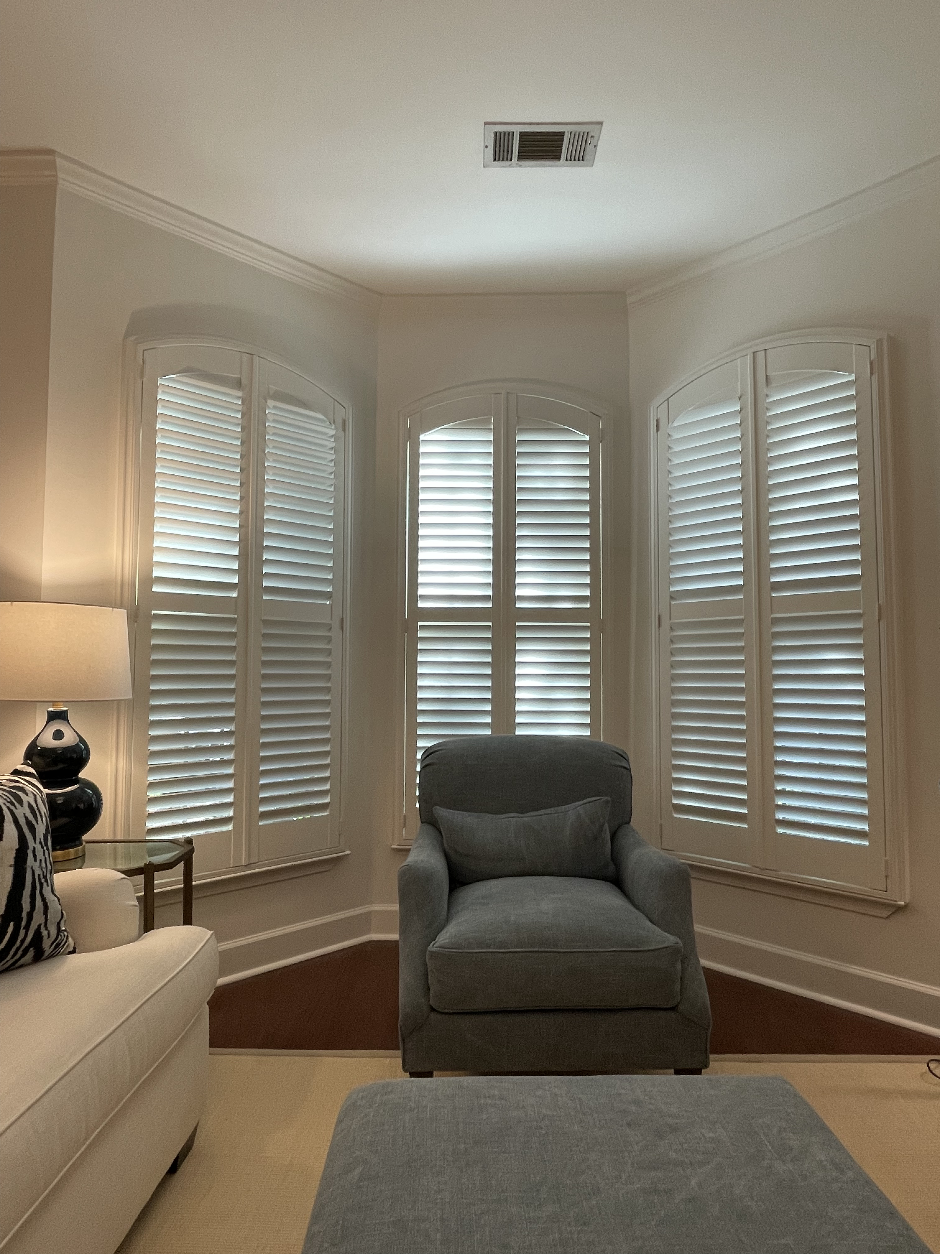 These Arched Wood Shutters beautifully accentuate the architectural details of this Historic Savannah row home.