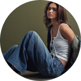 woman wearing jeans and tank top