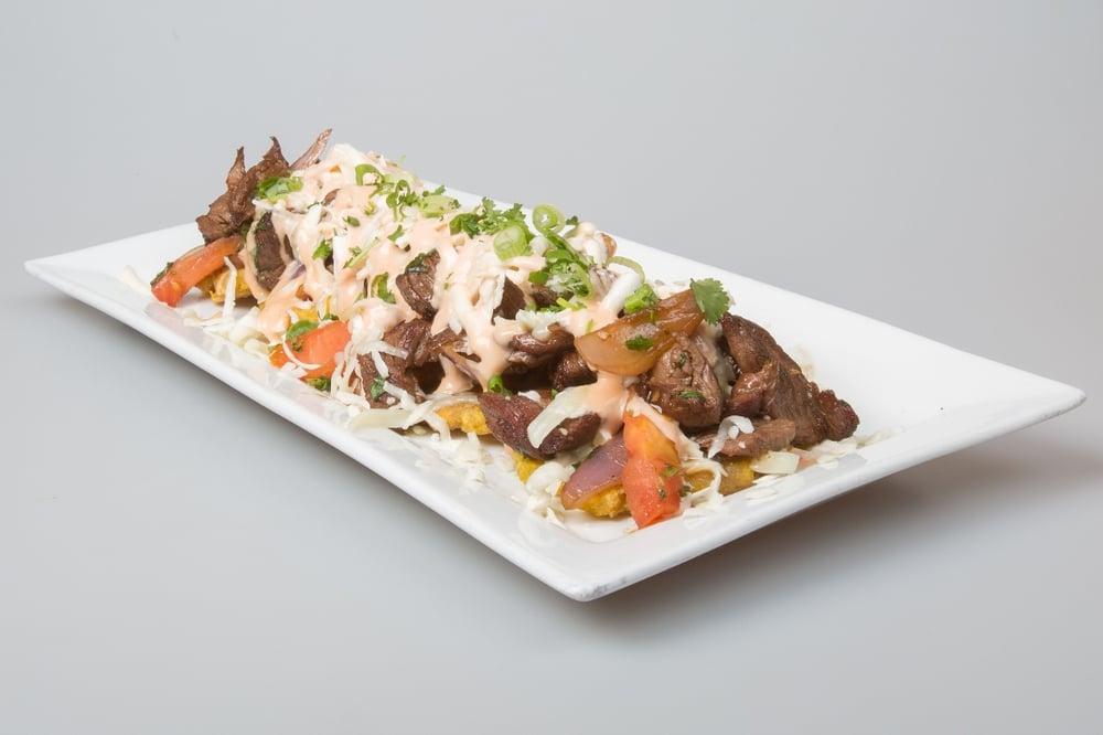 Fried Green Plantains With Wok Smoked Lomo Steak