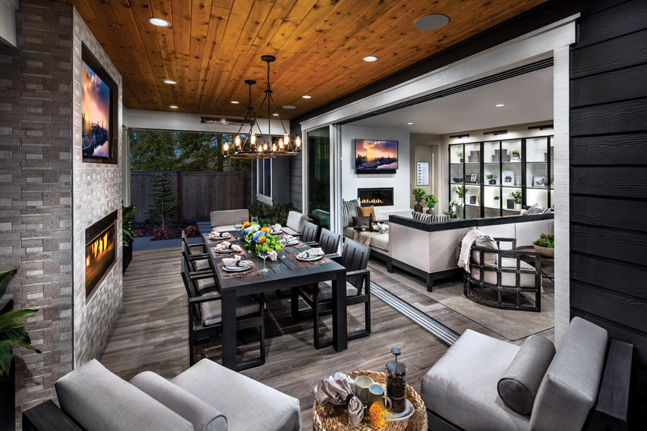 Covered back patios with options such as stacking glass doors and fireplaces blend the line between indoor and outdoor living