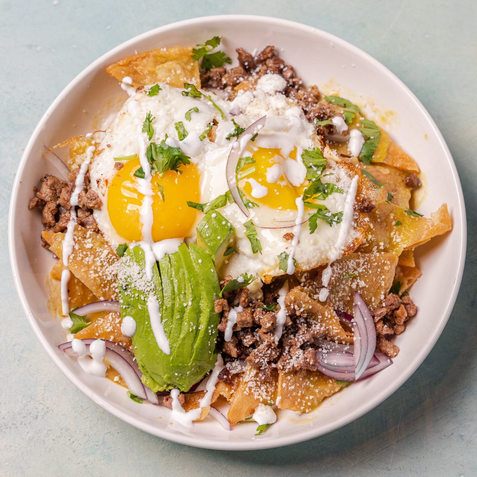 Chilaquiles Rojos / Verdes (Red / Green Sauce Tortilla Chips)