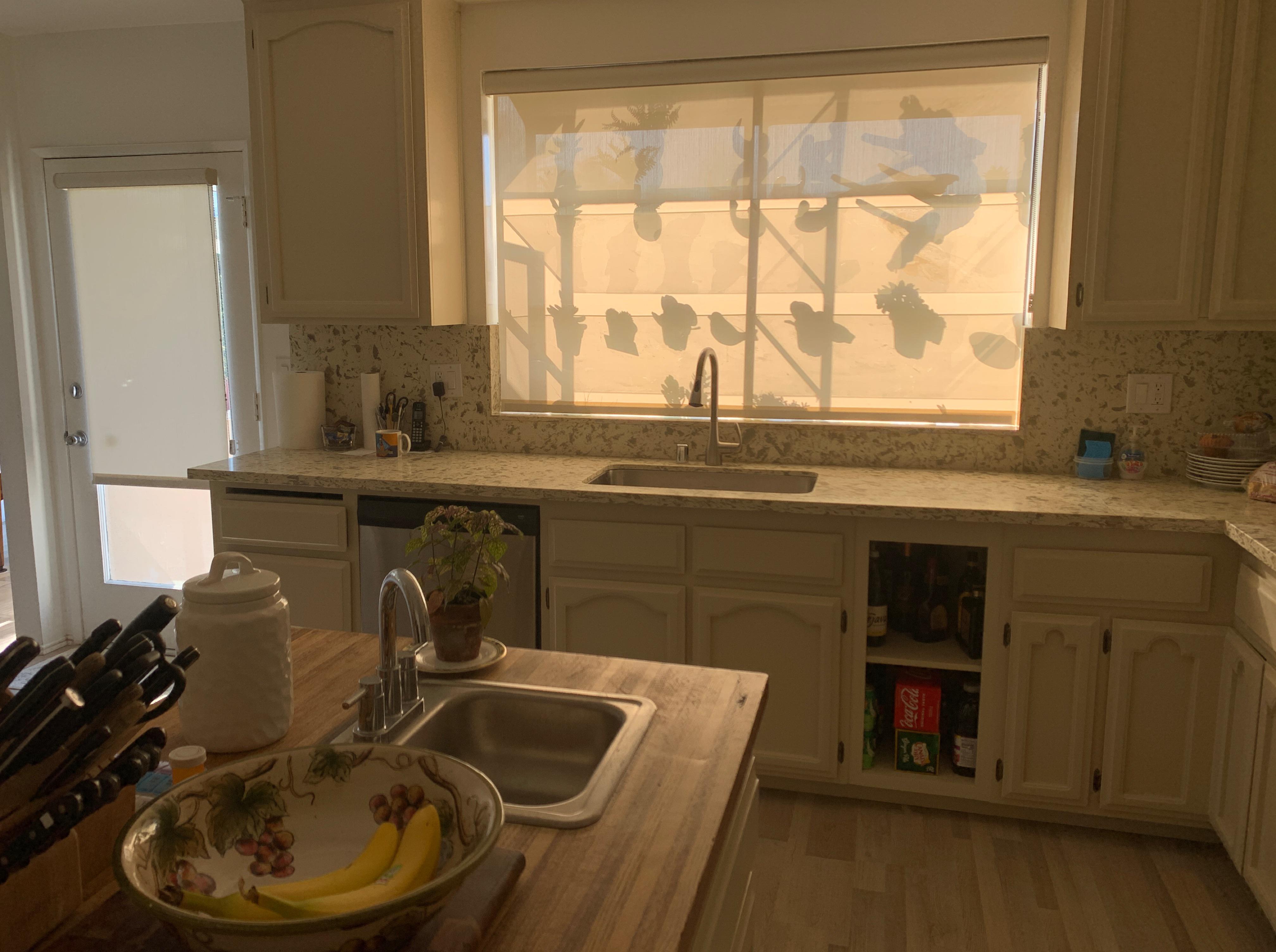 Solar shades in beige color help reduce glare, heat, and provides up to 99% UV protection while maintaining an outside view. https://surepulse-images.s3.us-east-1.amazonaws.com/uploads/3568/gallery-LgIgorpNESojzGvE-1642875067.jpg