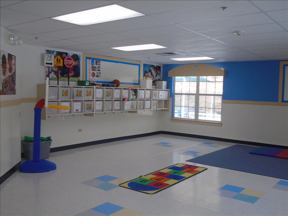 This is our Gross Motor Active Room! The children have  huge space that they can utilize if they can't get outside to get some fresh air!