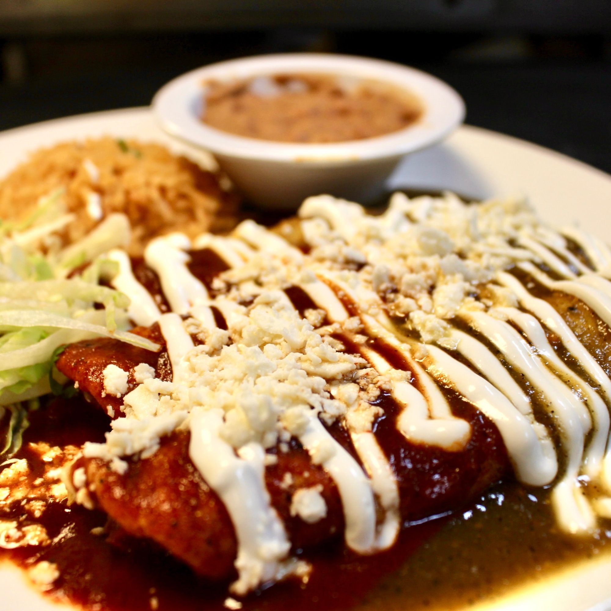 Las Enchiladas De Carne O' Pollo