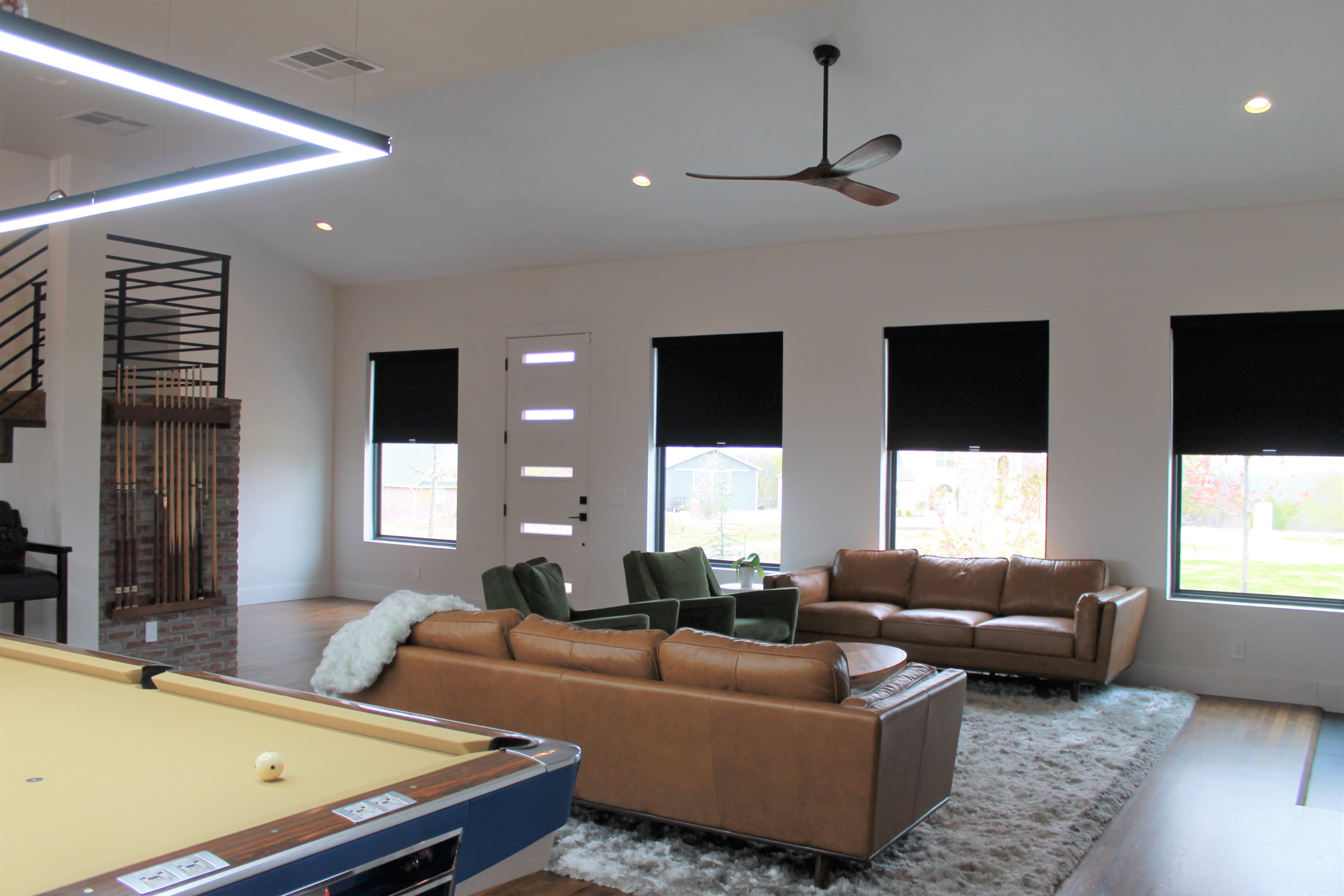 Are you looking for a simple and cost-effective transformation for your living room in Owasso, Oklahoma? Check out how gorgeous these Roller Shades look in this house.