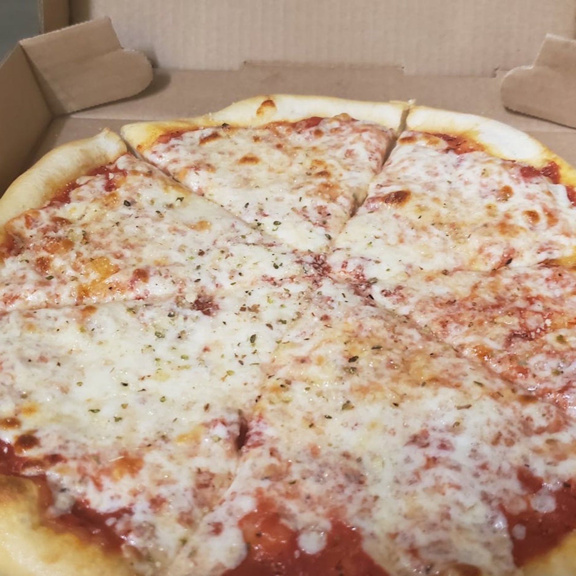 Traditional Thin-Crust Cheese Pizza