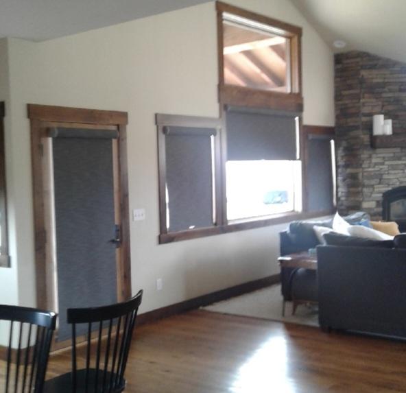 Springs Roller Shades with fabrice covered head rails installed in Pindale, WY by Budget Blinds of Rock Springs.