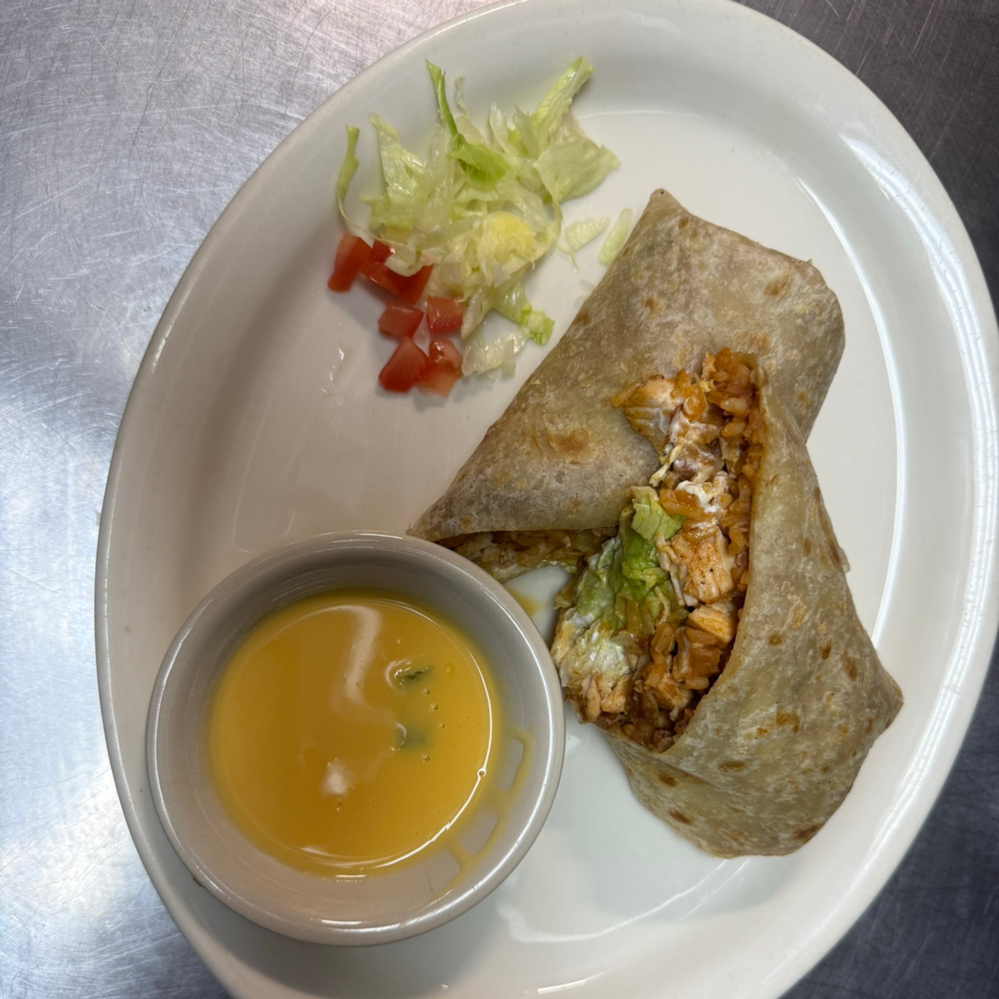￼ Chicken Fajitas California Burrito