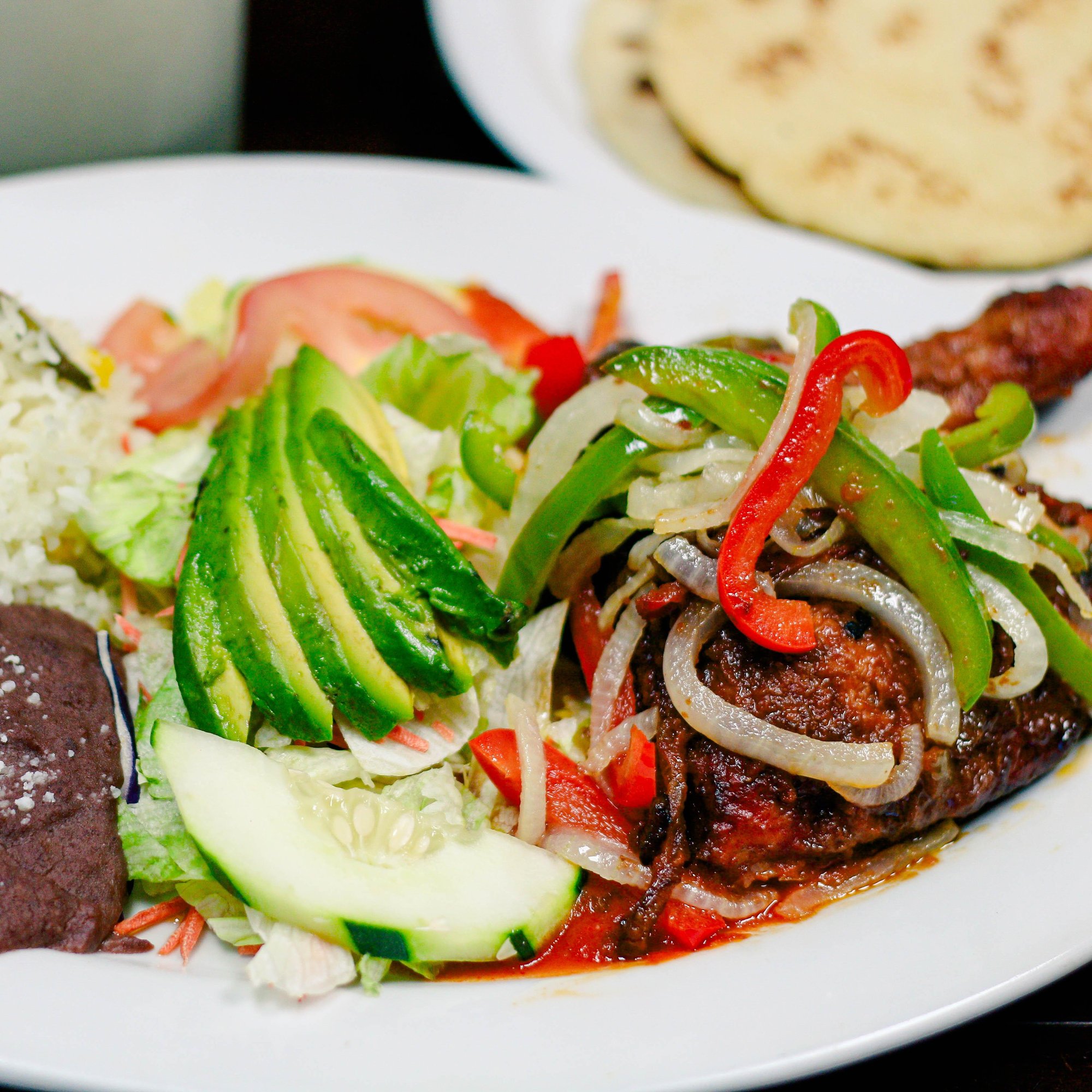 Pollo Encebollado