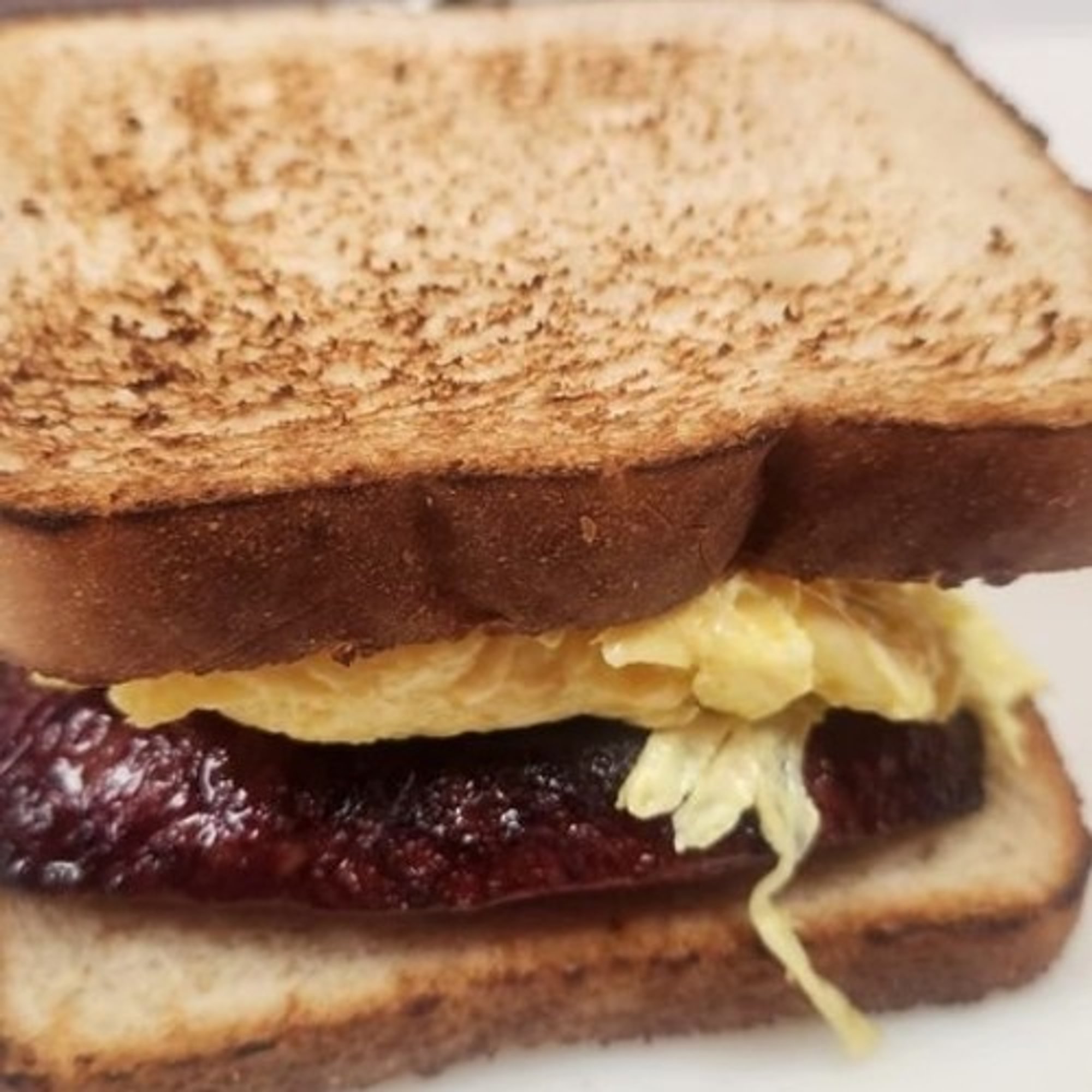 Egg And Bacon or Sausage Sandwich
