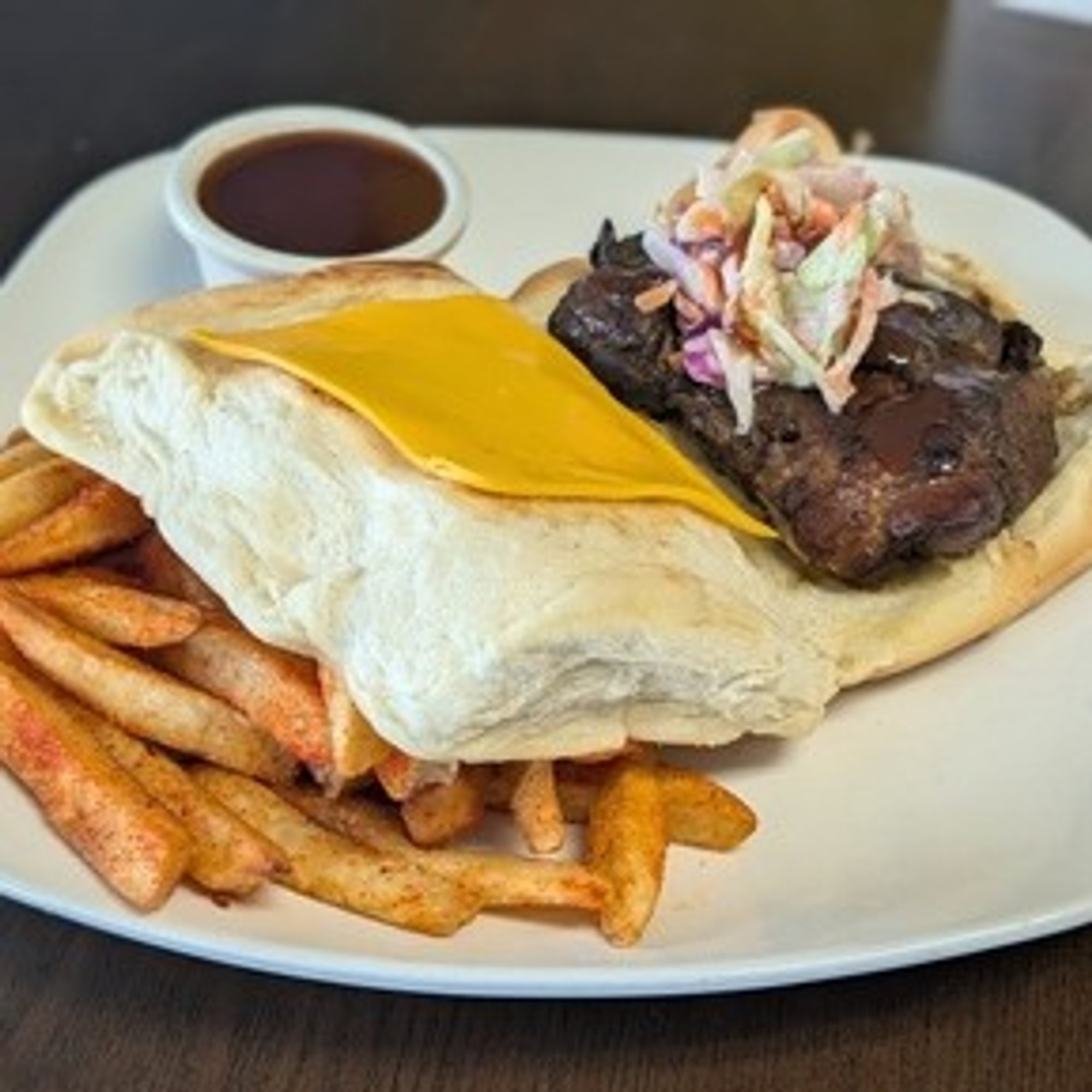 Jerk chicken coco bread sandwich