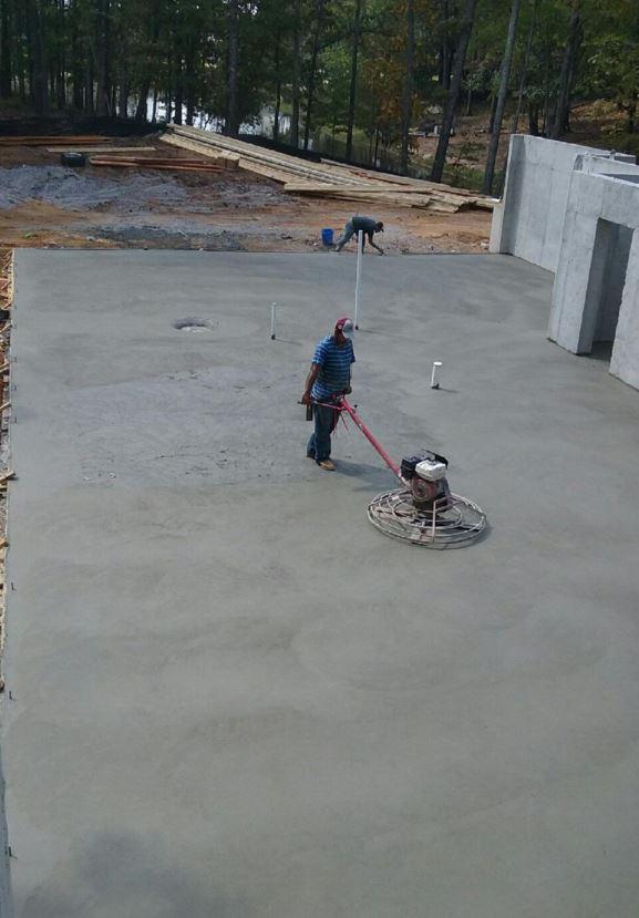 New home construction concrete basement foundation slab laid by NM Construction in Hoover, AL.