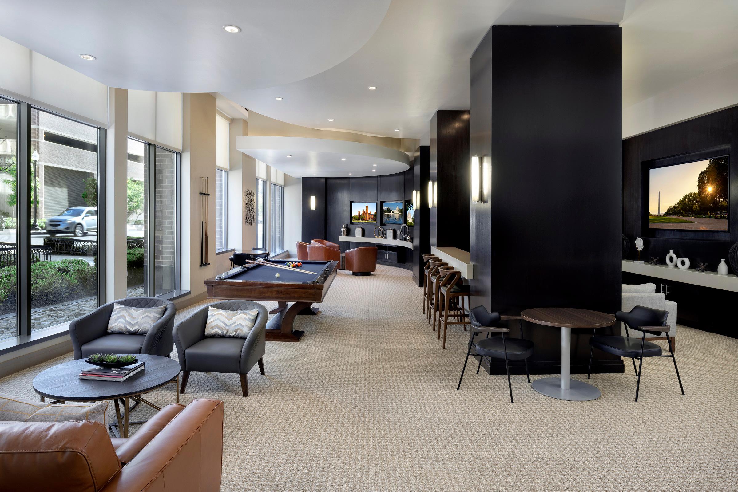 Resident lounge with billiards at Camden NoMa apartments in Washington D.C.