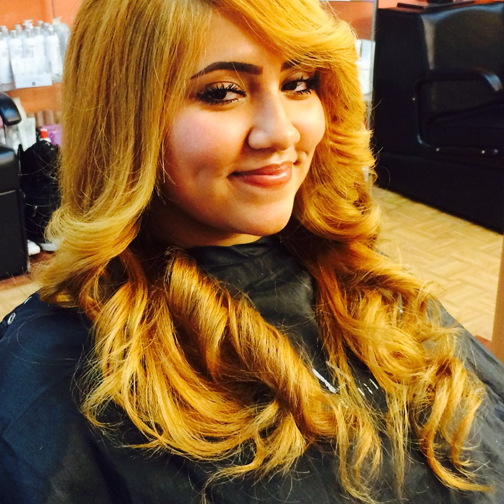 Juan Peluca Beauty Salon Corporation Logo