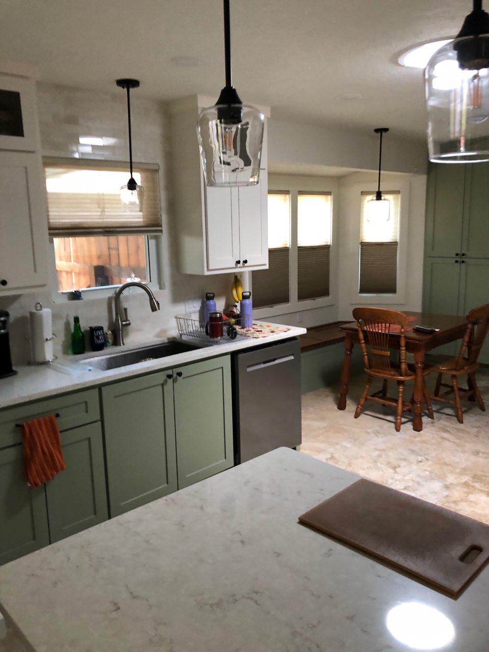 sheer pleated shade with roomdarkening cellular shade for kitchen area in Round Rock