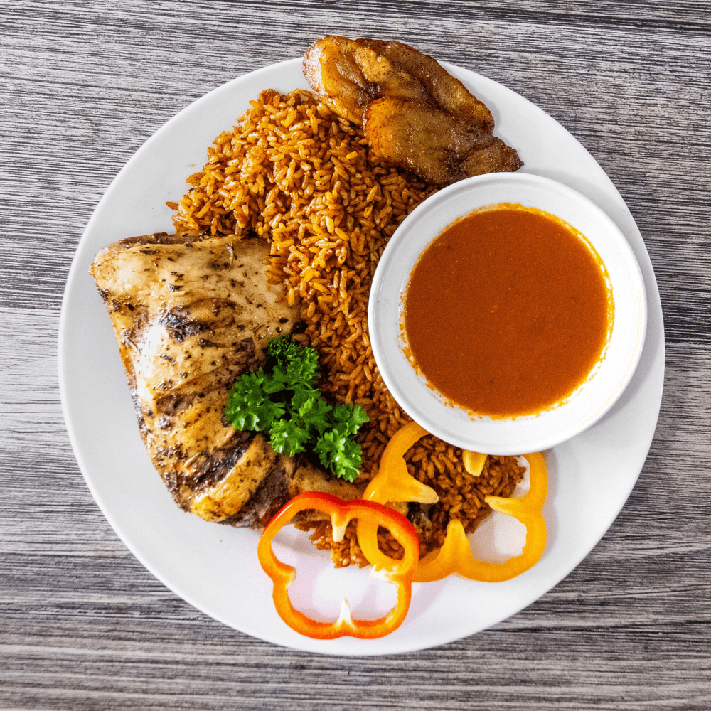 Jollof Rice with Fried Chicken Leg Quarters