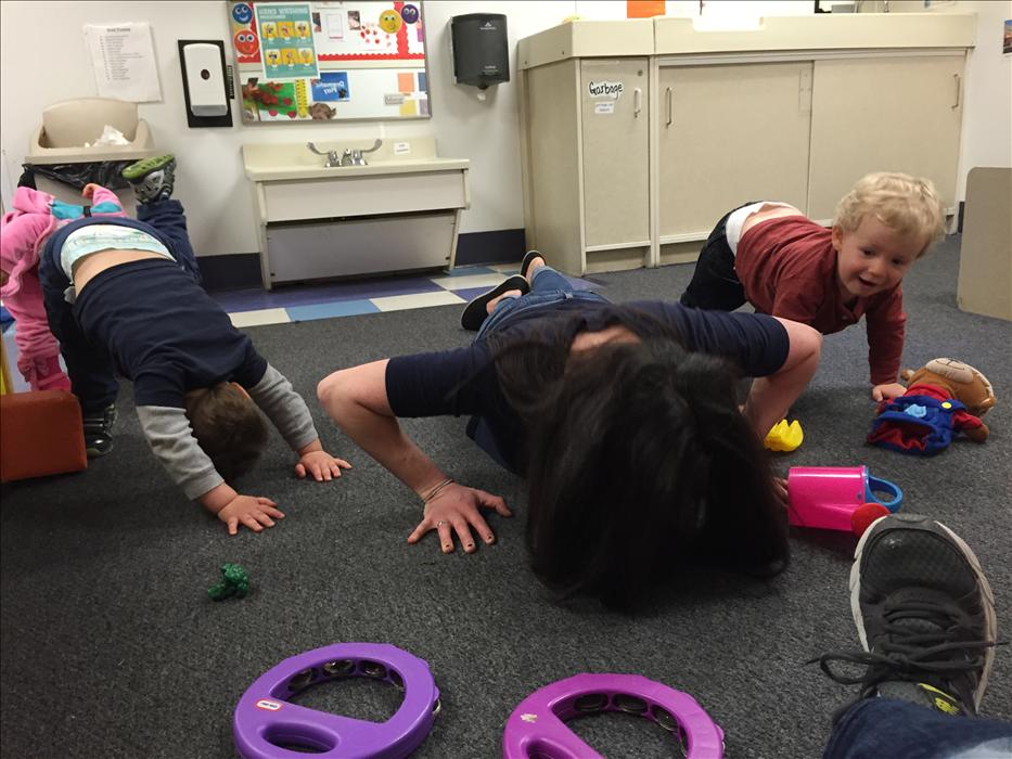 Miss. Rebecca enjoys teaching the children yoga. The children enjoy stretching and doing various poses.