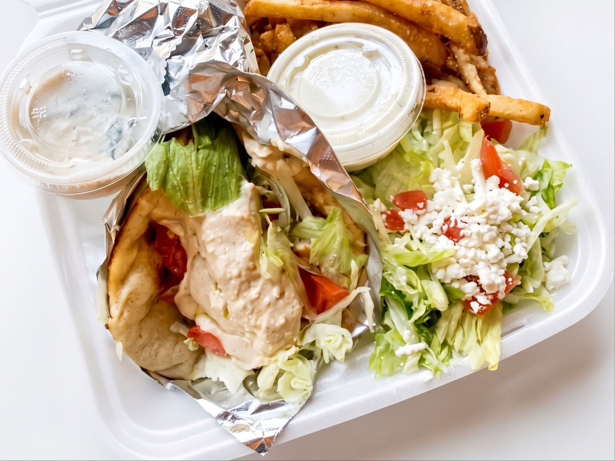 Chicken on Pita with Hummus (with a bag of chips)