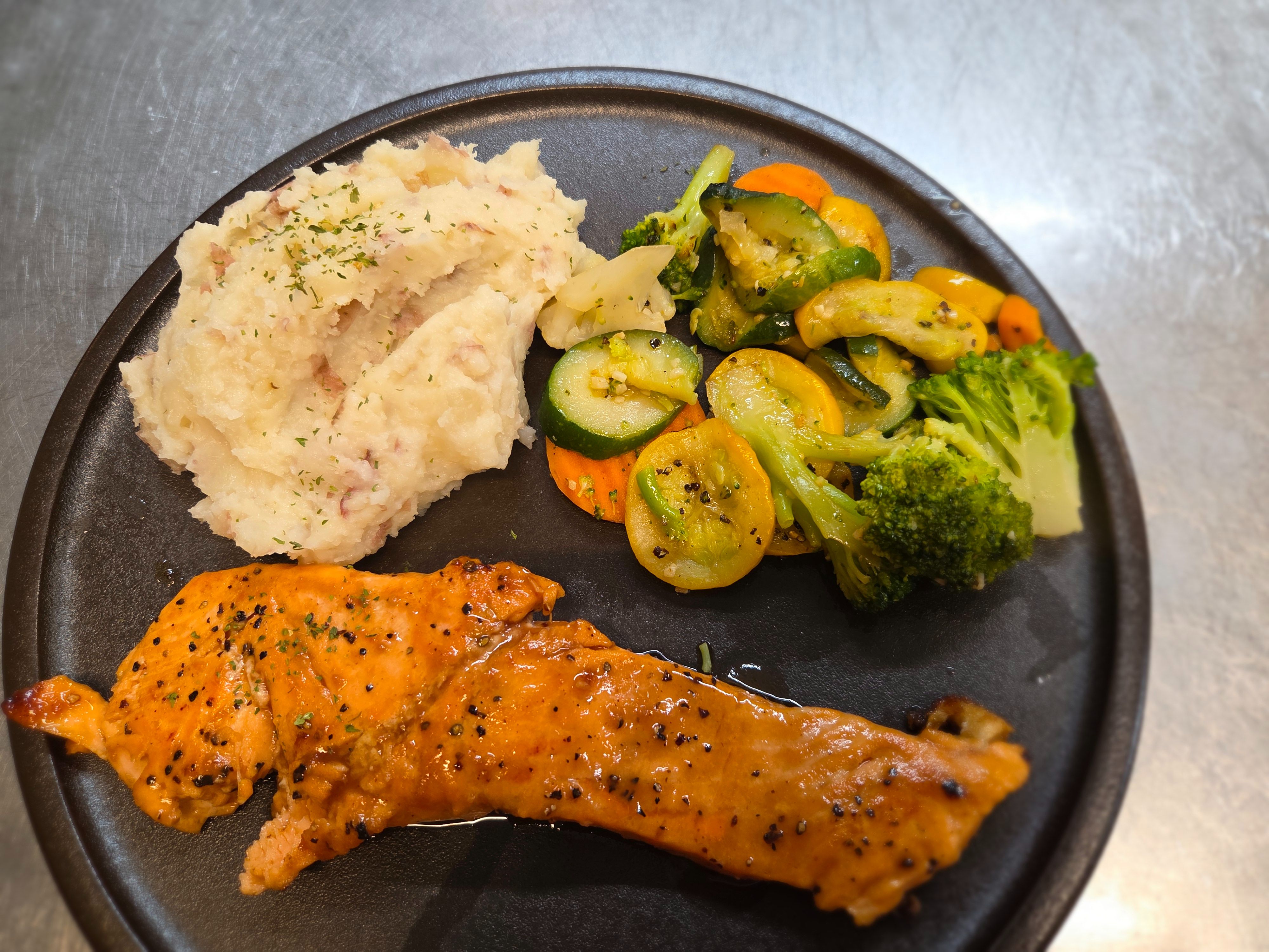 8oz Maple Bourbon Glazed Salmon w/ potato & Veg