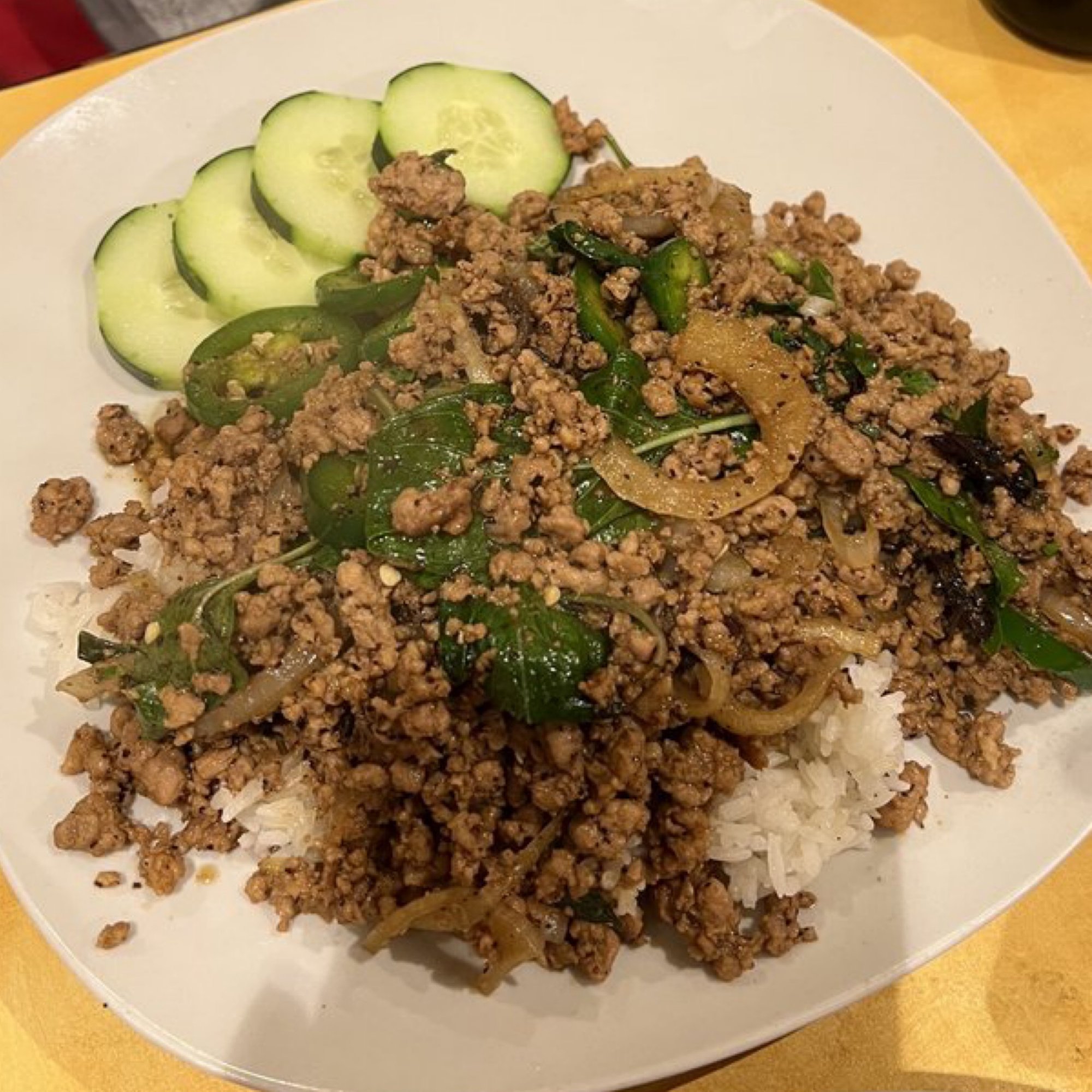 50. Basil leaf ground pork over rice
