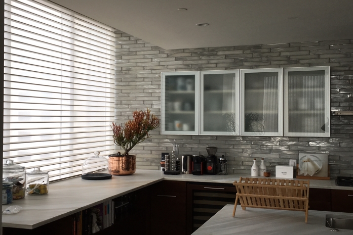 Hunter Douglas Silhouettes with PowerView add structured softness to a room, and wash the room with filtered light.
