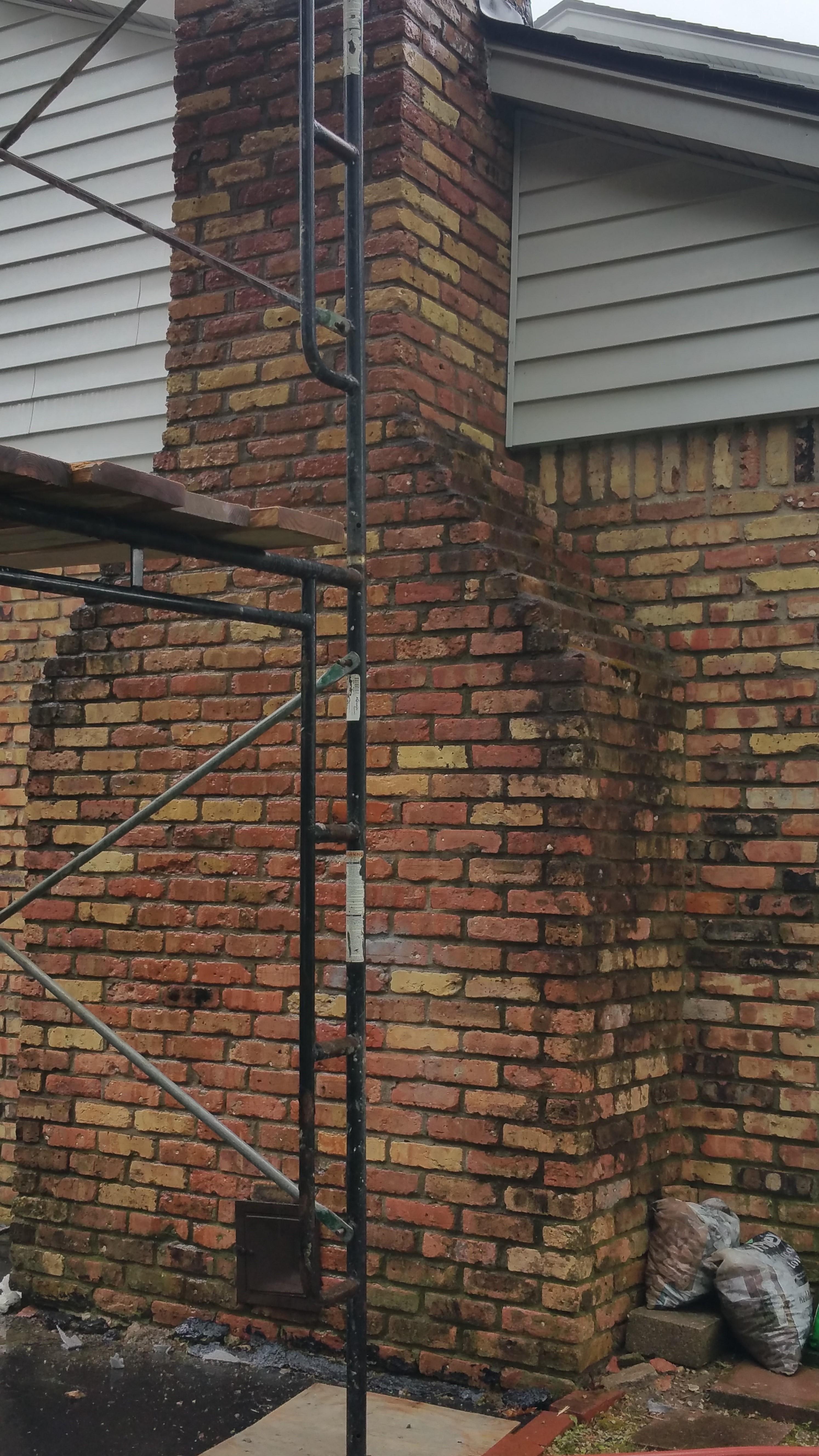 This is what the chimney looked like when we pulled up on the job. We chemically washed the brick, and added a dew chimney crown as well as a couple other things. 