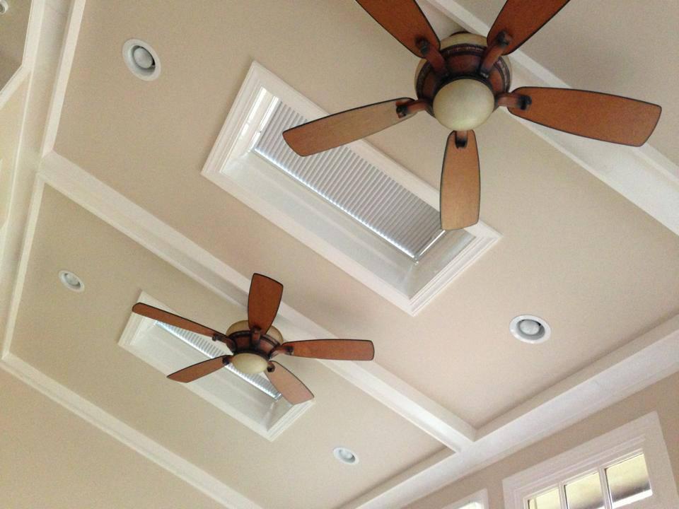 Cellular shades save the day!  Or at least the upholstery and flooring of this Skidaway Island sunroom.