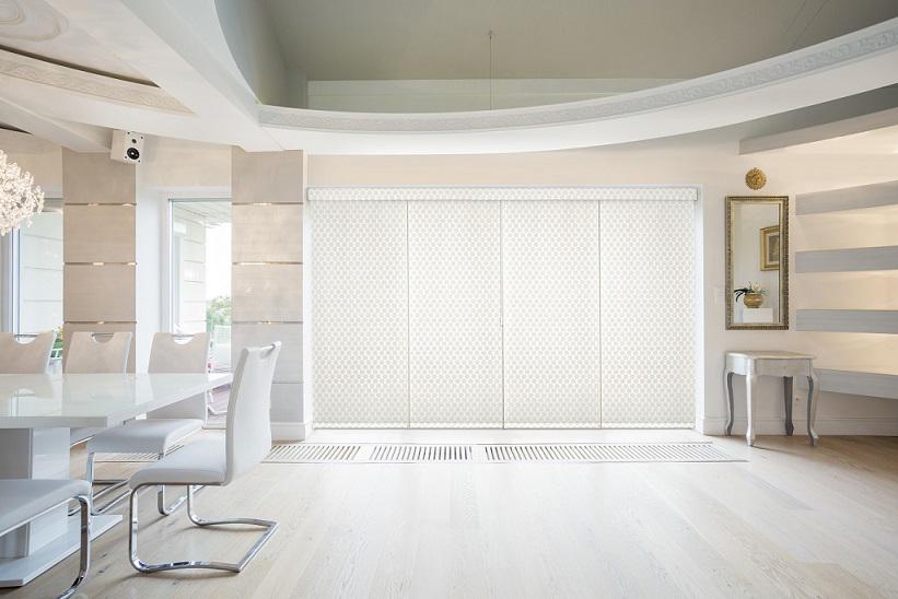 Sliding Panels by Budget Blinds of Tyson's Corner & Herndon stack neatly to the right or left, allowing easy access to a sliding glass door and are an ideal alternative if you aren't in love with the look of traditional vertical blinds. Endless color & pattern options bring the look you want to your