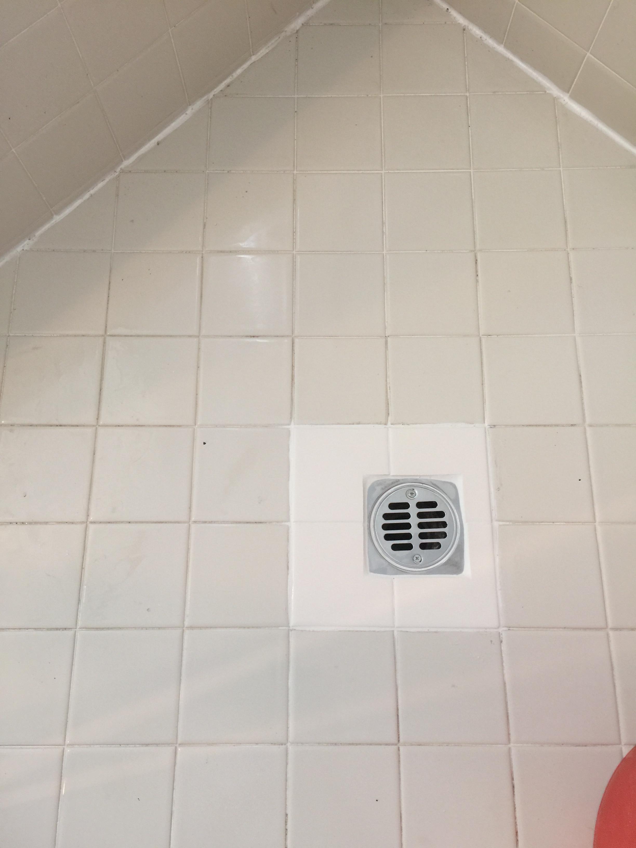 replace broken cast iron drain with abs p-trap and replace tile and water proof underlayment for tile, 