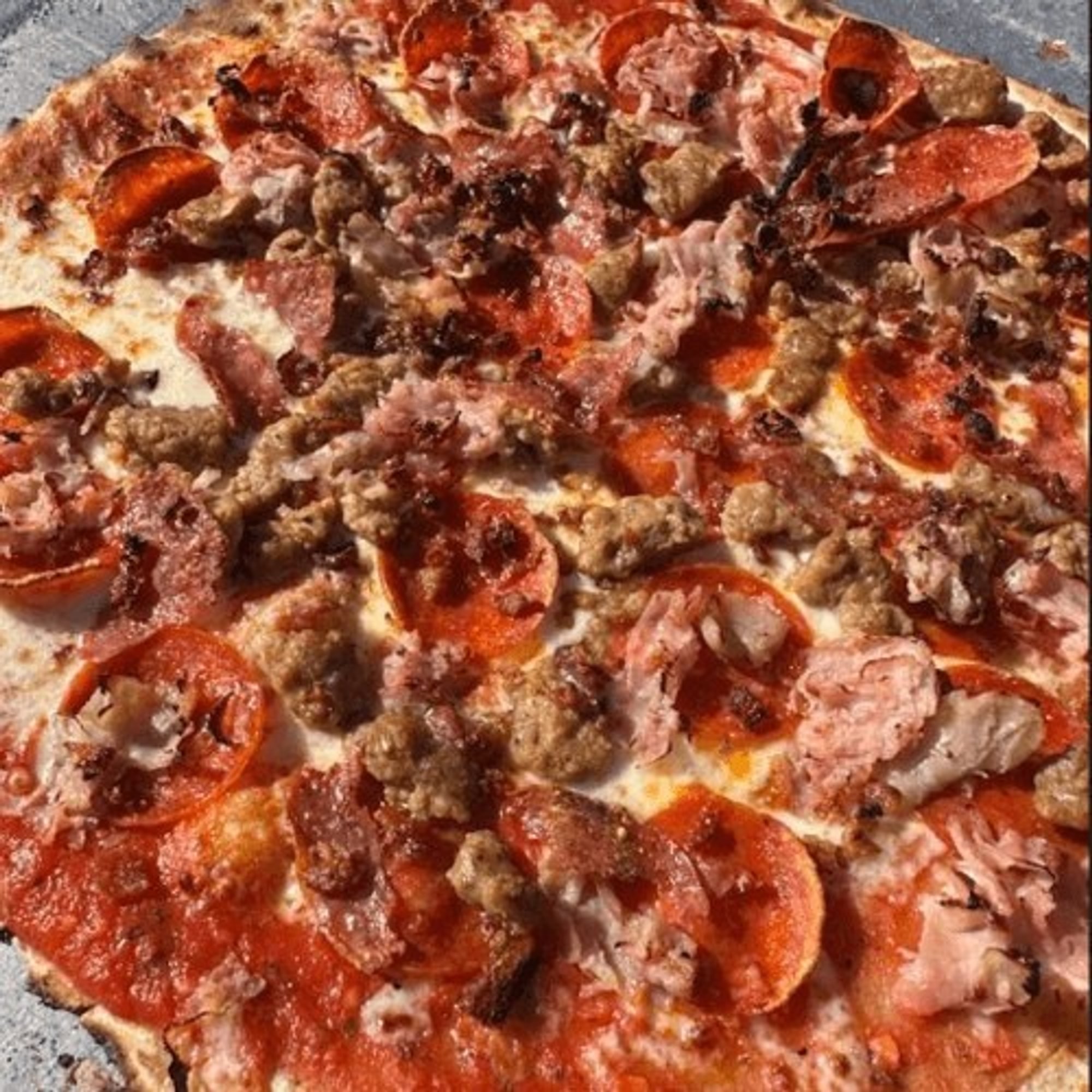 The Mighty Meaty Pizza