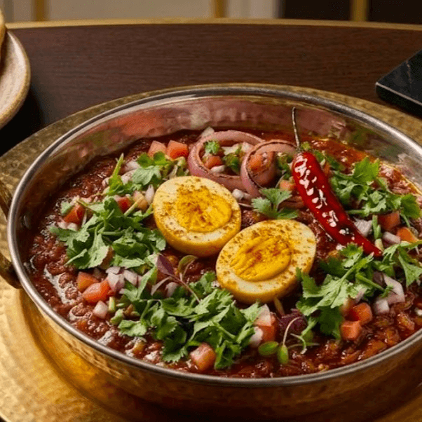 House Spiced Egg Masala