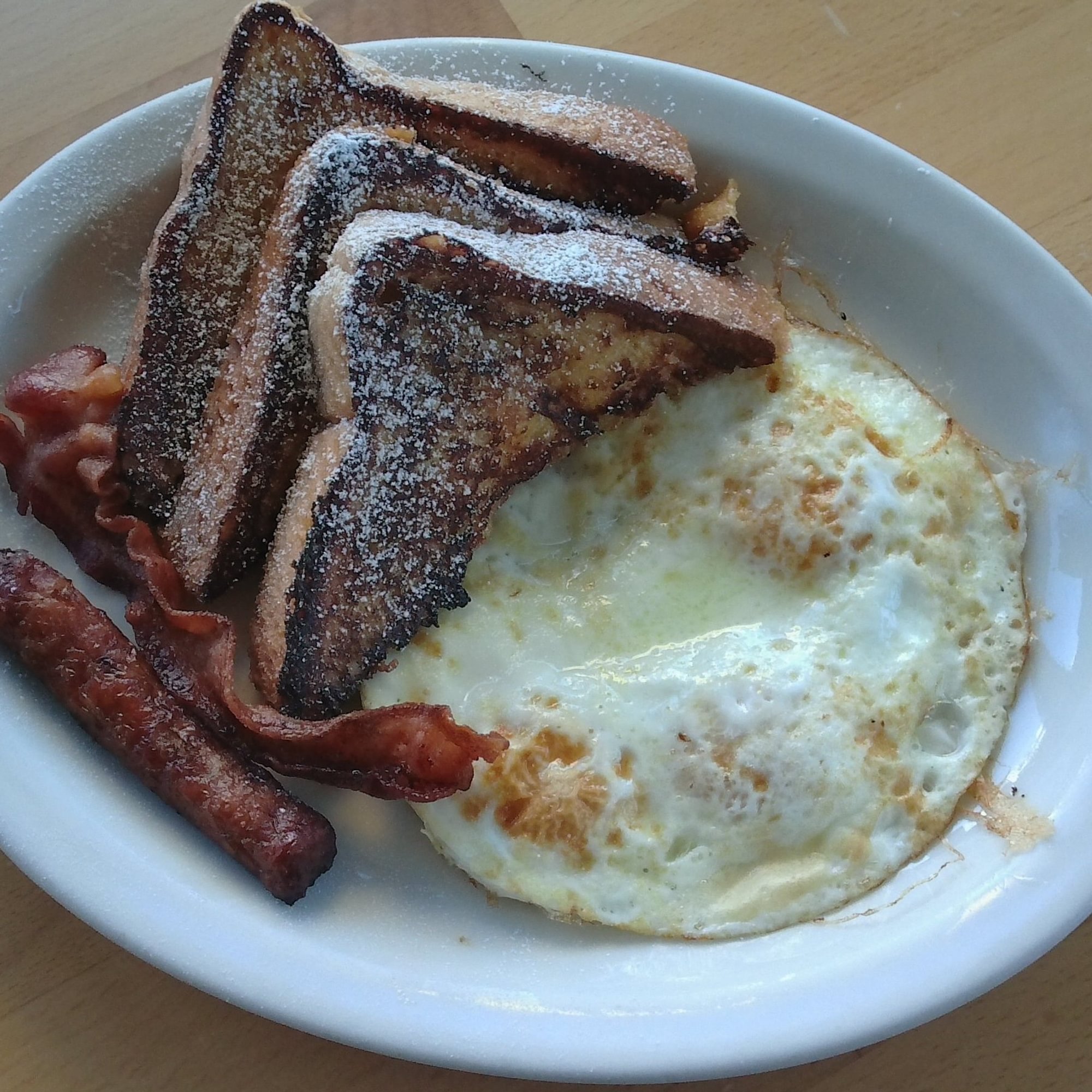 French Toast Special (3 Pieces, 2 Eggs, 1 Bacon & 1 Sausage)