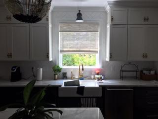 Woven Wood Roman Shades are a must over those newly renovated Kitchen Sinks