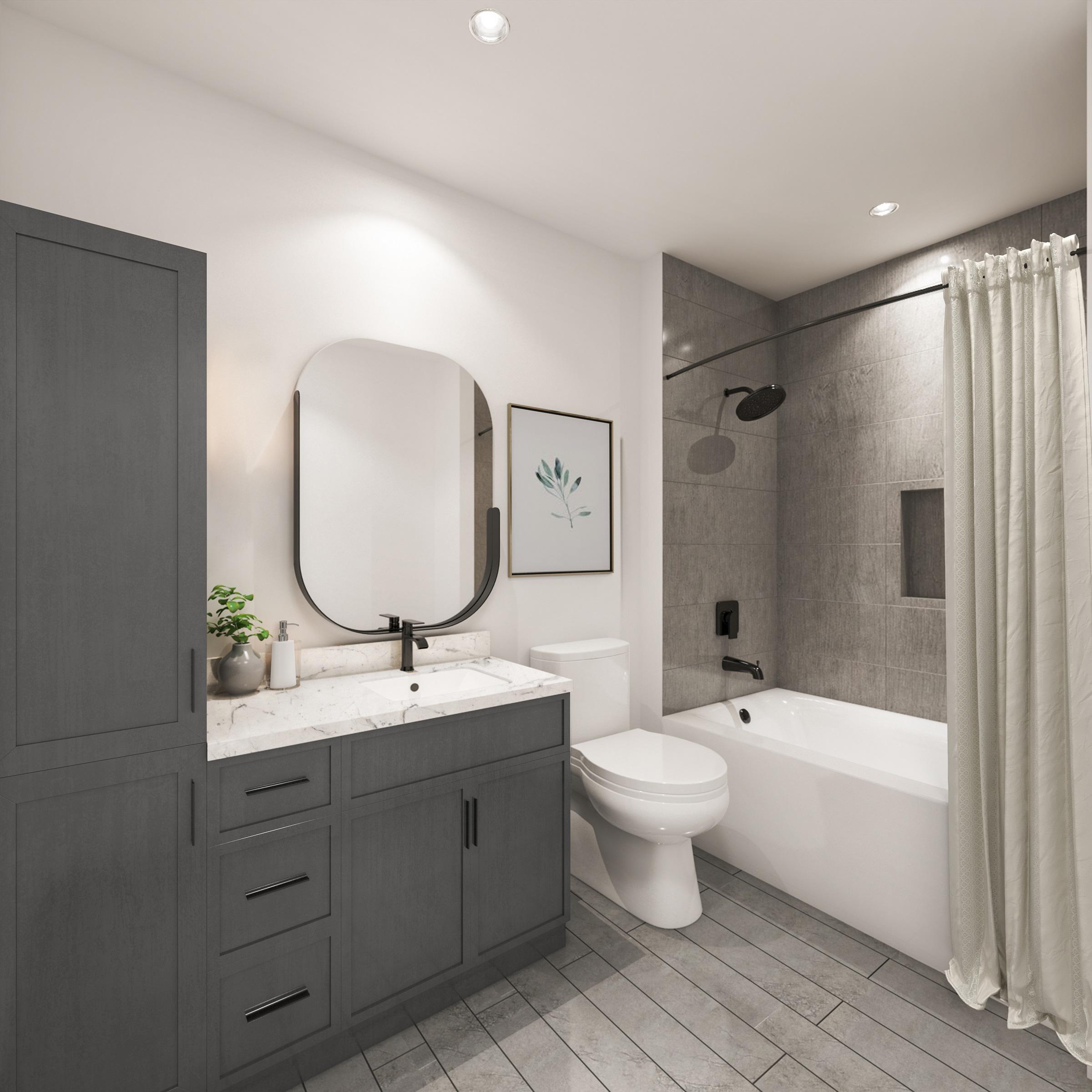 Bathroom with rainfall shower and soaking tub at Camden Durham