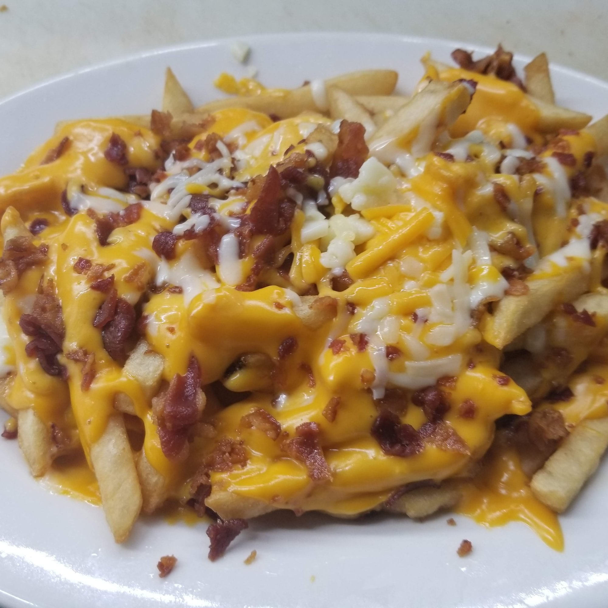 French Fries with Cheese & Bacon