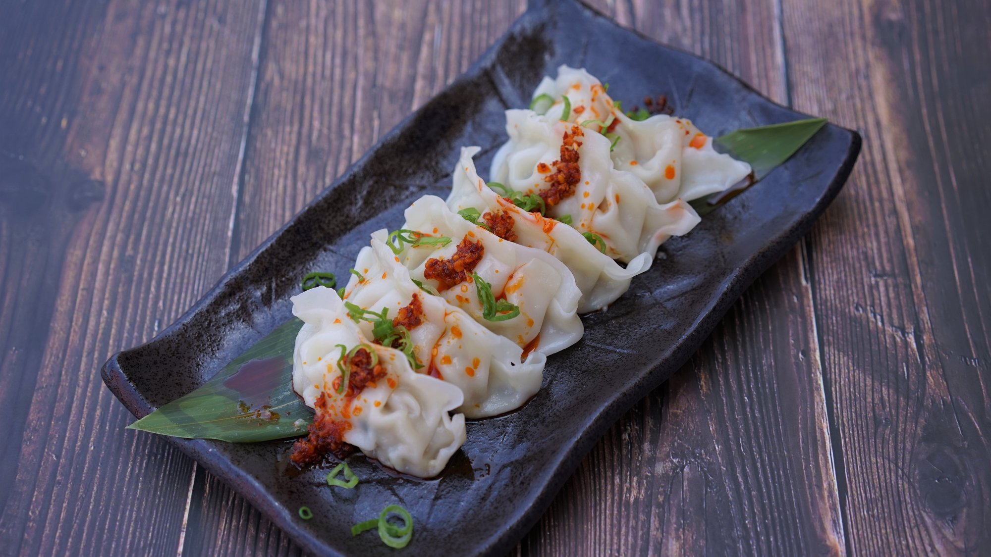 Dumplings with Spicy Garlic Sauce