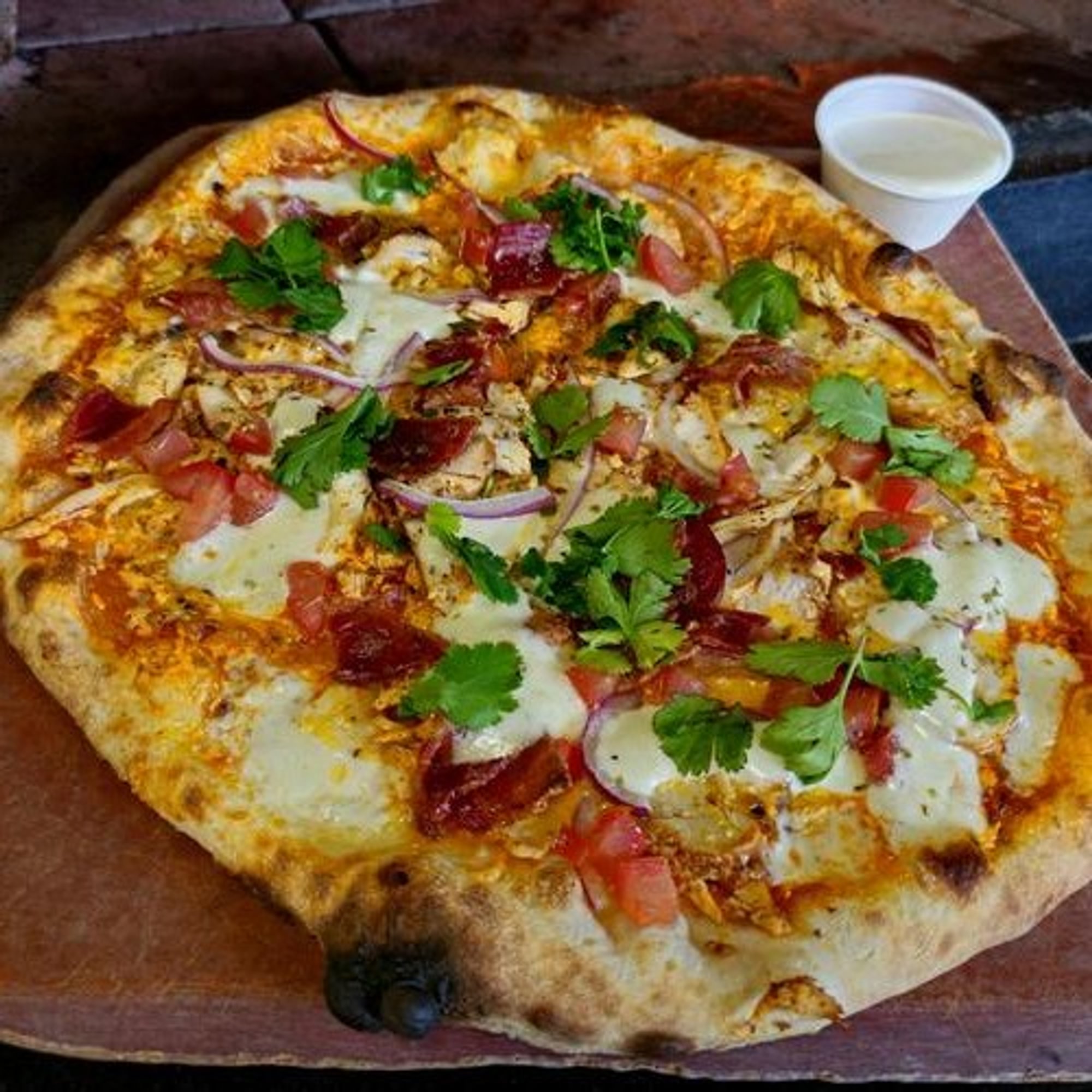 Rider's Bacon Buffalo Pizza