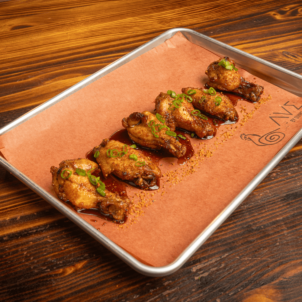 Korean chicken wings our style - miel con ají limo (6 pieces)